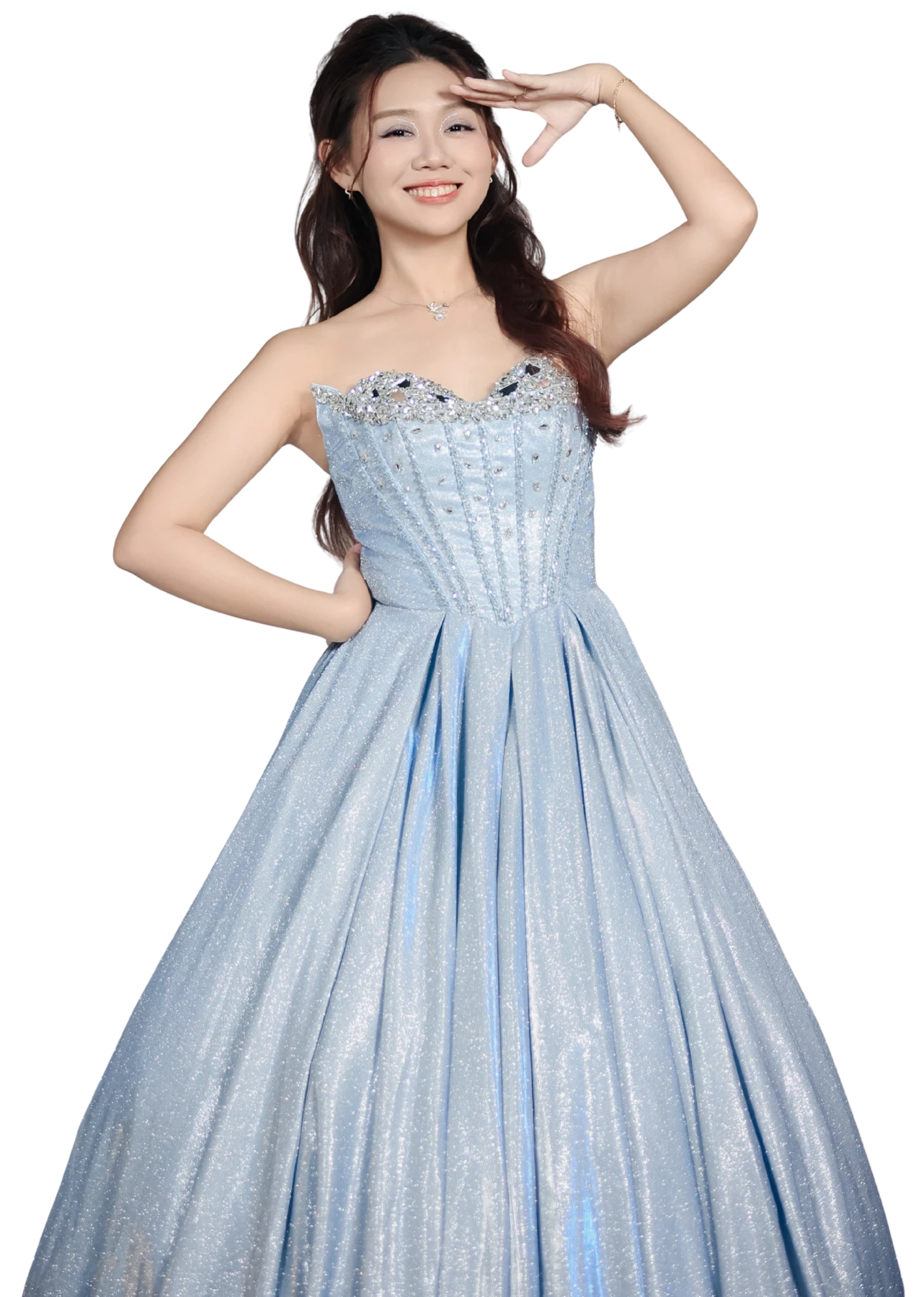 Eugenie Hang smiling in a pale blue gown with one hand raised